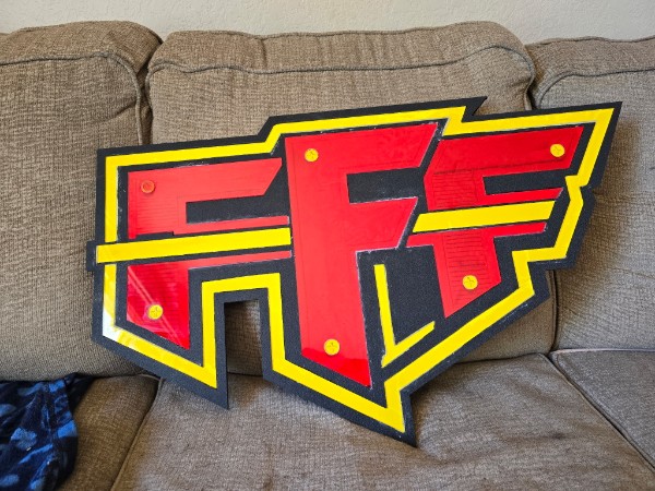FFF logo sign in red, yellow and black layers